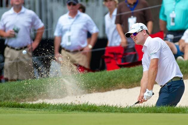 Aug. 4, 2012 - Akron, Ohio, U.S - Zach Johnson chips out of the bunker on the 16th hole during the third round of the WGC Bridgestone Invitational at Firestone Country Club, Akron, Oh. PGA Golf Herren 2012 - Aug 4 - Bridgestone Invitational - ZUMAs30