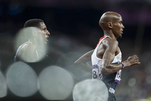 04.08.2012 Stratford, England. Great Britains Mohamed Mo Farah (GBR) wins a Gold medal in the Mens 10,000 metres during the Athletics on Day 8 of the London 2012 Olympic Games at the Olympic Stadium. xRoganxThomsonx  ActionPlus11312188