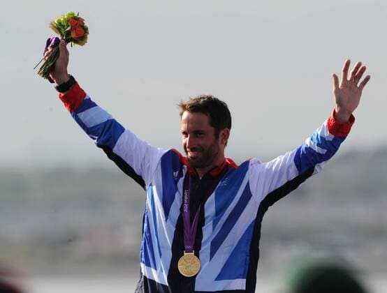 LONDON, Aug. 5, 2012 - Gold medalist Ben Ainslie of Britain attends victory ceremony of Finn Men contest of sailing event, at London 2012 Olympic Games in London, Britain, on August 5, 2012. 