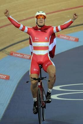 LONDON, Aug. 5, 2012 - Lasse Norman Hansen of Denmark celebrates after winning the men s omnium match of Cycling Track at London 2012 Olympic Games, London, Britain, Aug. 5, 2012. Lasse Norman Hansen won the gold of the event. 