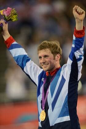 Jason Kenny of Britain celebrates at awarding ceremony of men s sprint of cycling event, at London 2012 Olympic Games, London - 