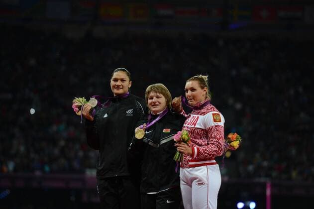 LONDON, Aug. 6, 2012 -- Goldmedalist Nadzeya Ostapchuk of Belarus (C), silvermedalist Valerie Adams of New Zealand (L) and bronzemedalist Evgenila Kolodko of Russia attend victory ceremony of women s shot put final contest, at London 2012 Olympic Games in London, Britain, on August 6, 2012. (Xinhua Yang Lei) (nxl) (OLY2012)BRITAIN-LONDON-ATHLETICS-WOMEN S SHOT PUT 