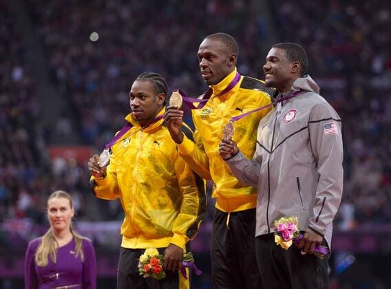 Yohan BLAKE, Usain BOLT (beie JAM) und Justin GATLIN (USA vlnr) bei der Siegerehrung fuer den 100 Meter Lauf. 11.Wettkampftag: Siegerehrung fuer den 100 Meter Lauf im Olympiastadion am 06.08.2012. Olympische Sommerspiele London 2012. -- Olympic Summer Games London 2012,