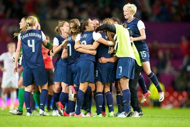 06.08.2012 Manchester, England. Team USA celebrate a last minute victory in the women s semi final match between Team USA and Canada at Old Trafford. USA scored a late injury time winner to go through to the gold medal match by a score of 4-3. x  ActionPlus20182266