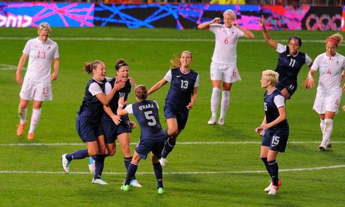 United States, (USA) Abby Wambach celebrates scoring from the penalty spot.Canada v USA Olympic 2012 semi-final women s match at Old Trafford, Manchester United Kingdom on the 6th August 2012..Pic Simon Bellis SPORTIMAGE. EDITORIAL USE ONLY. No use with unauthorised audio, video, data, fixture lists, club league logos or live services. Online in-match use limited to 120 images, no video emulation. No use in betting, games or single club league player publications.