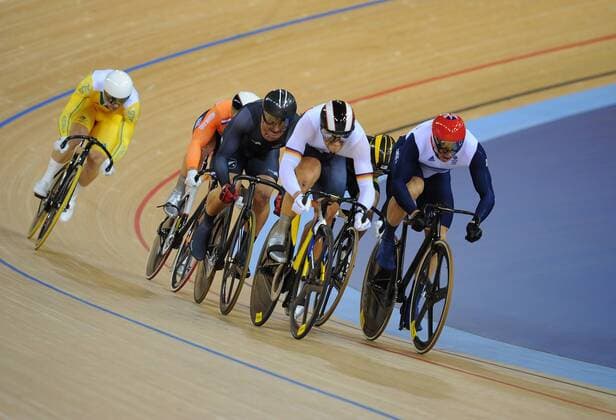 Olympics - London 2012 - Track Cycling Sir Chris Hoy (GBR) rounds the final bend to take his 6th Olympic Gold, in the Men s Keirin at the Olympic Stadium, London 