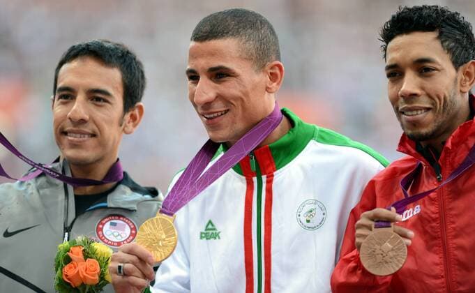LONDON, Aug. 8, 2012 - Gold medalist Taoufik Makhloufi of Algeria (C), silver medalist Leonel Manzano of USA (L) and bronze medalist Abdalaati Iguider Morocco attend victory ceremony of men s 1500m competition, at London 2012 Olympic Games in London, Britain, on August 8, 2012. (OLY2012)BRITAIN-LONDON-ATHLETICS-MEN S 1500M 