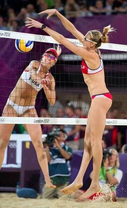Aug. 8, 2012 - London, GBR - Kerri Walsh Jennings of the United States, (USA), right, blocked a spike from Jennifer Kessy of the United States, left, in the gold medal match of women s beach volleyball at Horse Guard Parade during the 2012 Summer Olympic Games in London, England, Wednesday, August 8, 2012. Walsh Jennings and her partner, Misty May-Treanor, won their third straight gold medal. 2012 Summer Olympics Beach Volleyball - ZUMAm67
