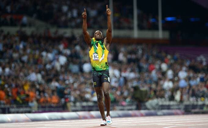 (120809) -- LONDON, Aug. 9, 2012 (Xinhua) -- Usain Bolt of Jamaica celebrates after men s 200m final, at London 2012 Olympic Games, London, Britain, Aug. 9, 2012. Usain Bolt won goldmedal with 19.32. (Xinhua Li Ga)(zgp) (OLY2012)BRITAIN-LONDON-MEN S 200M 