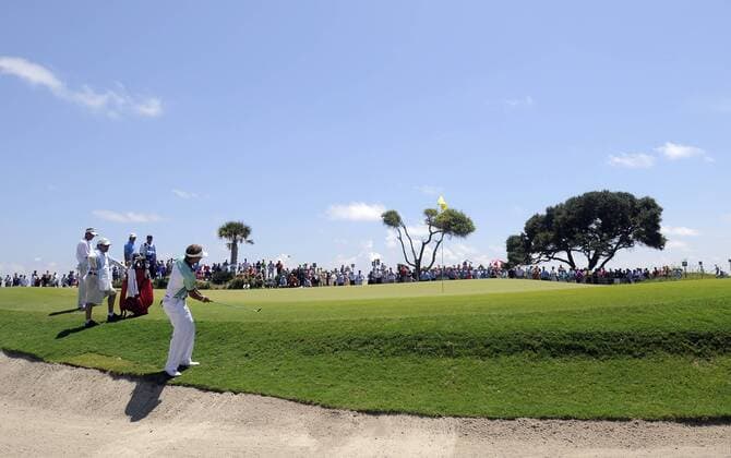 Loost Luiten of the Netherlands chips to the eighth green during the first round of the PGA Golf Herren Championship on August 9, 2012 at the Ocean Course in Kiawah Island, South, Carolina. Luiten carded six birdies and an eagle before giving up four strokes in a row on his back nine to finish the day at 4-under-par.  SCP20120809121