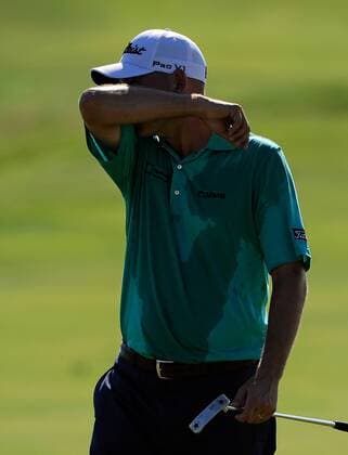 Bill Haas feels the heat on hole 11 during the first round of the PGA Golf Herren Championship on August 9, 2012 at the Ocean Course in Kiawah Island, South, Carolina.  SCP20120809119