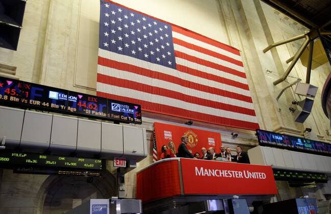 Co-chairmen Avram Glazer, Joel Glazer and other executives ring the opening bell at the New York Stock Exchange on the day when Manchester United Lists its Initial Public Offering at the NYSE on Wall Street In New York City on August 10, 2012. Manchester United will begin trading today on the NYSE under the ticker symbol MANU.  NYP20120810111