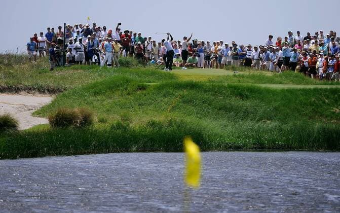 Spectators watch Vijay Singh of Fiji from the hole 17 tee during the second round of the PGA Golf Herren Championship on August 10, 2012 at the Ocean Course in Kiawah Island, South, Carolina.  SCP20120810121