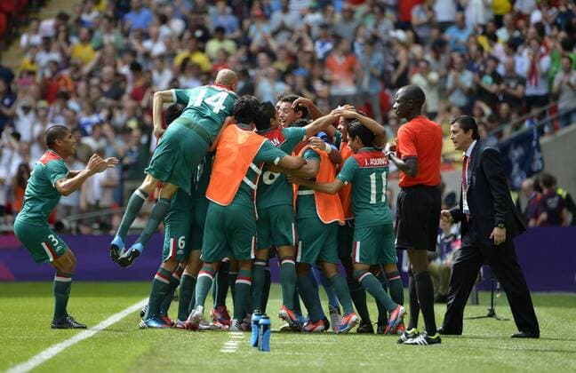 Mexico celebrates forward Oribe Peralta s goal during the first half of the Gold Medal Football Match against Brazil at the London 2012 Summer Olympics on August 11, 2012 at Wembley Stadium, London.  OLY20120811404