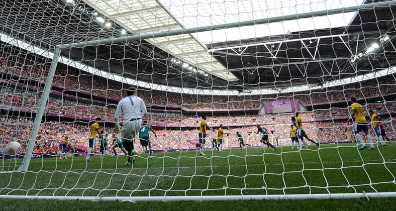 LONDON, Aug. 11, 2012 - Mexican players celebrate the second goal during men s football final match between Brazil and Mexico, at London 2012 Olympic Games in London, Britain, on August 11, 2012. Mexico won the match 2-1 and won gold medal. (OLY2012)BRITAIN-LONDON-MEN S FOOTBALL-GOLD 