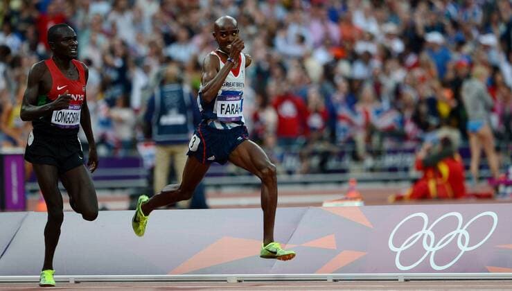(120811) -- LONDON, Aug. 11, 2012 (Xinhua) -- Mohamed Mo Farah (R) of Britain competes in men s 5000m final at London 2012 Olympic Games, London, Britain, Aug. 11, 2012. Mohamed Mo Farah won gold medal with 13:41.66. (Xinhua Wang Jianhua)(zgp) (OLY2012)BRITAIN-LONDON-MEN S 5000M-GOLD 