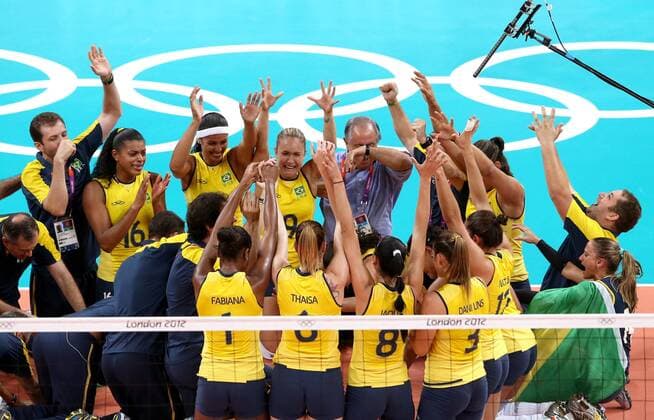 Brazilian players celebrate after women s volleyball gold medal match between Brazil and USA, at London 2012 Olympic Games in London, Britain, on August 11, 2012. (Xinhua Fan Jun) (nxl) (OLY2012)BRITAIN-LONDON-VOLLEYBALL-WOMEN 