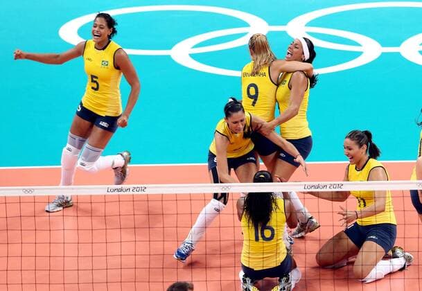 Brazilian players celebrate after women s volleyball gold medal match between Brazil and USA, at London 2012 Olympic Games in London, Britain, on August 11, 2012. (Xinhua Fan Jun) (nxl) (OLY2012)BRITAIN-LONDON-VOLLEYBALL-WOMEN 