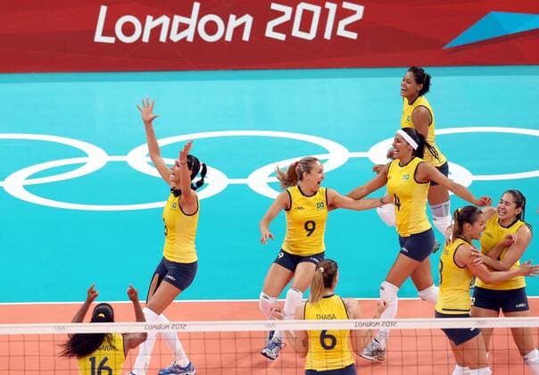 Brazilian players celebrate after women s volleyball gold medal match between Brazil and USA, at London 2012 Olympic Games in London, Britain, on August 11, 2012. (Xinhua Fan Jun) (nxl) (OLY2012)BRITAIN-LONDON-VOLLEYBALL-WOMEN 