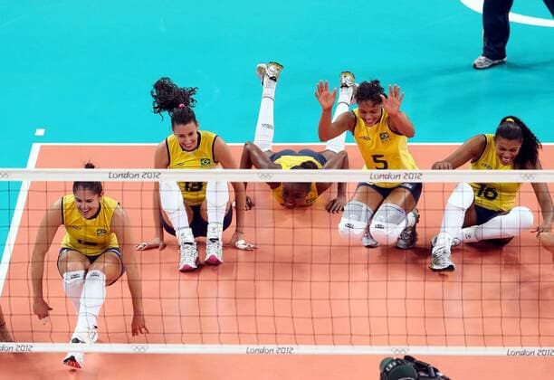 Brazilian players celebrate after women s volleyball gold medal match between Brazil and USA, at London 2012 Olympic Games in London, Britain, on August 11, 2012. (Xinhua Fan Jun) (nxl) (OLY2012)BRITAIN-LONDON-VOLLEYBALL-WOMEN 