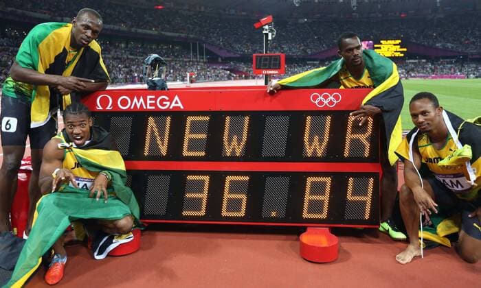 (120811) -- LONDON, Aug. 11, 2012 (Xinhua) -- Usain Bolt, Yohan Blake, Nesta Carter, and Michael Frater (from L to R) of Jamaica celebrate after men s 4x100m relay final at London 2012 Olympic Games, London, Britain, Aug. 11, 2012. The Jamaican team won with a new world record of 36.84. (Xinhua Liao Yujie)(zgp) (OLY2012)BRITAIN-LONDON-MEN S 4X100M RELAY-GOLD 