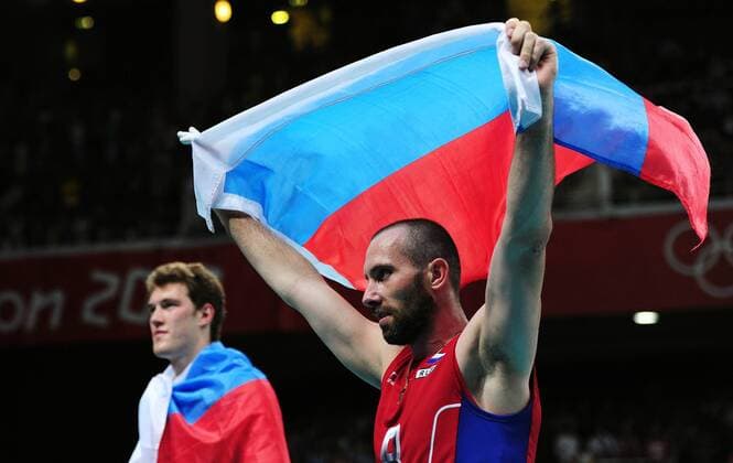LONDON, Aug. 12, 2012 - Sergey Tetyukhin (R) - Russian players celebrate after men s volleyball match between Russia and Brazil, at London 2012 Olympic Games in London, Britain, on August 12, 2012. Russia won 3-2. (Xinhua Tao Xiyi) (nxl) (OLY2012)BRITAIN-LONDON-VOLLEYBALL-MEN 