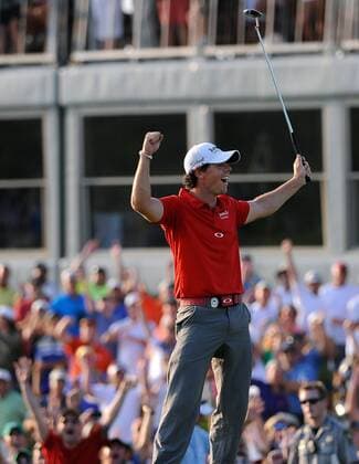 Rory McIlroy of Northern Ireland celebrates a birdie putt on hole 18 for his 8-stroke victory in the final round of the PGA Golf Herren Championship on August 12, 2012 at the Ocean Course in Kiawah Island, South, Carolina.  SCP20120812126