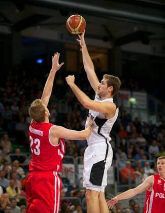 Basketball Bamberg 12.08.2012 Supercup Herren Finale Deutschland (GER) - Polen (POL) Tim Ohlbrecht (Deutschland, No.04) Jakub Wojciechowski