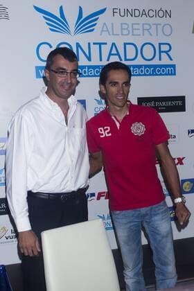 13.08.2012. The cyclist Alberto Contador presented at the Hotel Las Artes in Pinto charity campaign to collect bicycles for the Tour of Spain. In the image (L-R) Javier Guillen, Director General of the Tour of Spain and Alberto Contador (Alterphotos Marta Gonzalez)  (20185403)