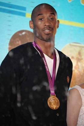 NBA superstar Kobe Byrant wearing his London Olympic basketball gold medal attends a charity banquet of the Kobe Bryant China Fund in Shanghai, China, 14 August 2012. Kobe Bryant starts China charity tour in Shanghai  pau690287_06
