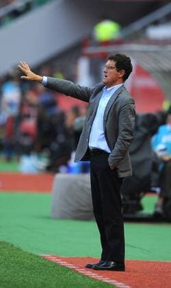 ITAR-TASS: MOSCOW, RUSSIA. AUGUST 15, 2012. Russia s head coach Fabio Capello instructs his team from the sideline during their international football friendly against Cote d Ivoire at Lokomotiv Stadium. The game ended in a 1-1 draw.  premiumd 20140065