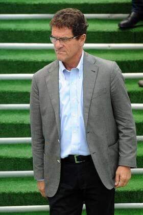 ITAR-TASS: MOSCOW, RUSSIA. AUGUST 15, 2012. Russia s head coach Fabio Capello reacts during an international football friendly between Russia and Cote d Ivoire at Lokomotiv Stadium. The game ended in a 1-1 draw.  RE105FC0