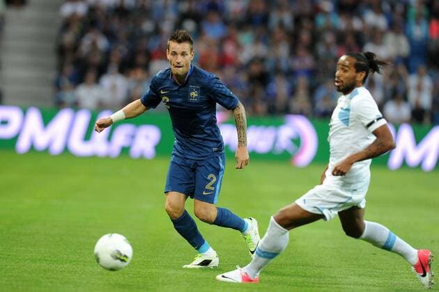 Mathieu Debuchy (France) Alvaro Pereira (Uruguay) FOOTBALL : France vs Uruguay - Match amical - 15 08 2012 N.LeGouic FEP Panoramic 
