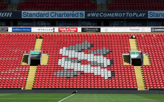 Football - soccer: UEFA Europa League, Liverpool FC - Standard Chartered Bank s logo on the seats of Liverpool s Centenary Stand at Anfield. xHOCHxZWEIx xPropagandax 
