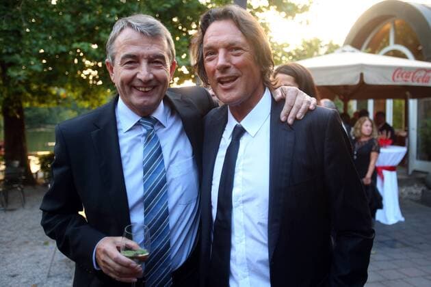 MUNICH, GERMANY - AUGUST 16: Hans-Wilhelm Müller Wohlfahrt (R) welcomes Wolfgang Niersbach, president of the German Football Federation DFB during Hans-Wilhelm Müller Wohlfahrts 70th birthday celebration at Seehaus on August 16, 2012 in Munich, Germany - Local Caption Hans-Wilhelm Müller Wohlfahrt; Wolfgang Niersbach 