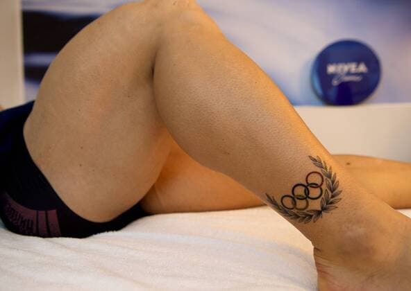 Berlin NIVEA Haus Unter den Linden 17.08.2012 Massagen und Kosmetik für die erfolgreichen Olympiateilnehmer aus Berlin Robert FOERSTEMANN Rad Sprint mit neuem Olympia TATOO Foto camera 4