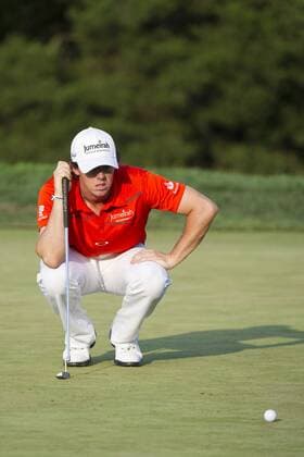 24 August 2012: Rory Mcilroy (NIR) lines up a putt on the 18th hole during the second round of The Barclays Championship for The FedEx Cup played at Bethpage Black in Farmingdale, NewYork. GOLF: AUG 24 PGA Golf Herren - The Barclays - Second Round Icon082412394 EDITORIAL USE ONLY