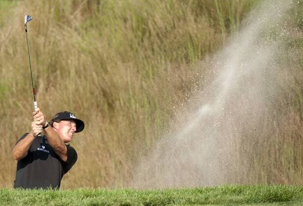24 August 2012: Phil Mickelson (USA) hits out of the sand bunker on the 16th hole during the second round of The Barclays Championship for The FedEx Cup played at Bethpage Black in Farmingdale, NewYork. GOLF: AUG 24 PGA Golf Herren - The Barclays - Second Round Icon082412413 EDITORIAL USE ONLY