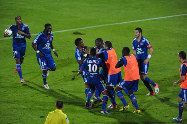 Joie de Michel Bastos et de ses coequipiers (Lyon) FOOTBALL : Evian Thonon Gaillard FC vs Olympique Lyon - Ligue 1 - 24 08 2012 FredericChambert Panoramic 