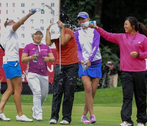 Aug. 26, 2012 - Coquitlam, BC, Canada - August 26, 2012 - Coquitlam, British Columbia, Canada - LIDIA KO getting a water shower from some other players on the 18th green during the Final Round of the CN Canadian Women s Open at The Vancouver Golf Club. Golf 2012 - Canadian Woman s Open - Final Round  - ZUMAs11