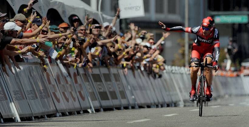 Denver, CO, USA - George Hincapie of BMC Racing waves to the crowd as he near the finish of the time trials to end his career Sunday, August 26, 2012, on the final day of the USA Pro Challenge in Denver, Colorado. Hincapie finished a record 17 Tour de France race. US Pro Challenge - ZUMAm67