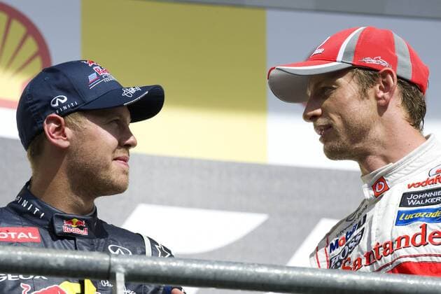 Sebastian VETTEL (li., GER), Red Bull Racing, und Jenson BUTTON (GBR), MCLaren Mercedes, sehen sich an, Rennen am 02.09.2012 Formel 1, Grosser Preis von Belgien in Spa Francorchamps vom 30.08. - 02.09.2012., Saison2012,,
