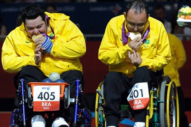04.09.2012 Stratford, England. Eliseu dos Santos and Dirceu Jose Pinto of Brazil on the medal podium for the Boccia Mixed Pairs BC4 on day 6 of the London 2012 Paralympic Games at the ExCel Centre. xDavidxEmmx  ActionPlus20142931