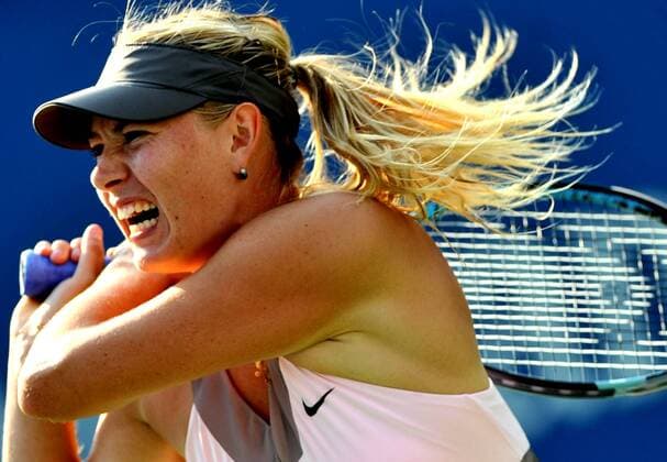 (120908) -- NEW YORK, Sept. 8, 2012 (Xinhua) -- Maria Sharapova of Russia returns the ball during the women s singles semifinal match against Victoria Azarenka of Belarus at the U.S. Open tennis tournament in New York, the United States, Sept. 7, 2012. Maria Sharapova lost 1:2. (Xinhua Wang Lei) US-NEW YORK-TENNIS-US OPEN-WOMEN S SINGLES-SEMIFINAL 