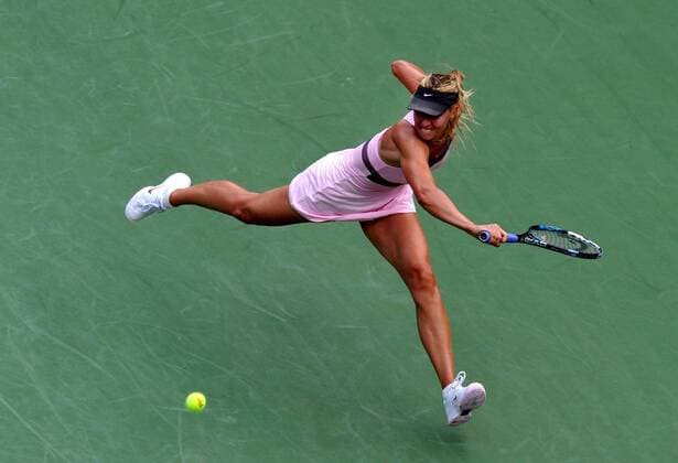 (120908) -- NEW YORK, Sept. 8, 2012 (Xinhua) -- Maria Sharapova of Russia returns the ball during the women s singles semifinal match against Victoria Azarenka of Belarus at the U.S. Open tennis tournament in New York, the United States, Sept. 7, 2012. Maria Sharapova lost 1:2. (Xinhua Wang Lei) US-NEW YORK-TENNIS-US OPEN-WOMEN S SINGLES-SEMIFINAL 