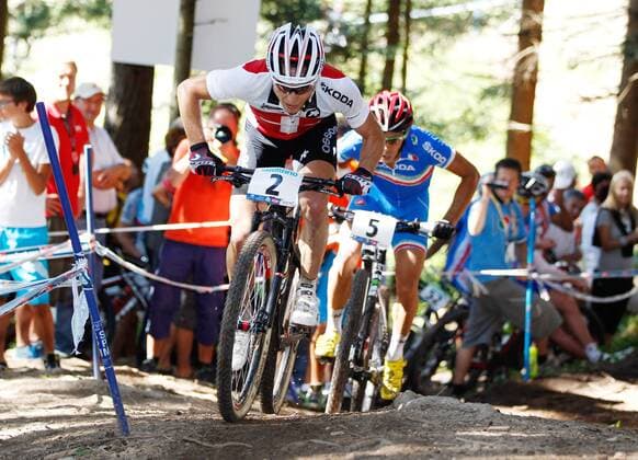 RADSPORT - UCI Weltmeisterschaften SAALFELDEN,AUSTRIA,08.SEP.12 - DIVERS, RADSPORT, MOUNTAINBIKE - UCI Weltmeisterschaften, Cross-country, Herren, Elite. Bild zeigt Nino Schurter (SUI) und Marco Aurelio Fontana (ITA). 