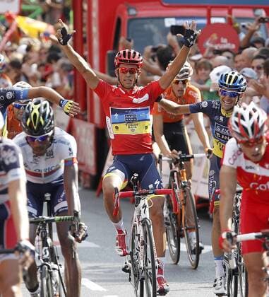 Alberto Contador celebrates with his partners the victory in La Vuelta when comes to the finish line in the stage of La Vuelta 2012 beetwen Cercedilla and Madrid.September 9,2012.  (20144054)