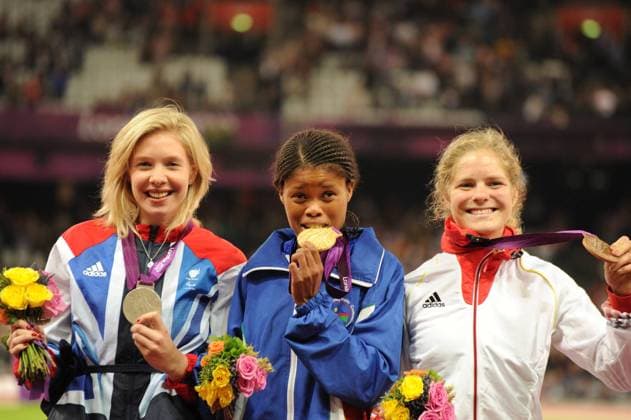 05.09.2012 London, England. Olympic Stadium.Women s 200m T37. Medal Ceremony. (Gold) Johanna Benson (NAM)(Silver ) Bethany Woodward (IRL)(Bronze) Maria Seifert (GER) pictured receiving their medals on Day 7 of the Paralympics from the Olympic Stadium. xAnthonyxStanleyx  ActionPlus20144070