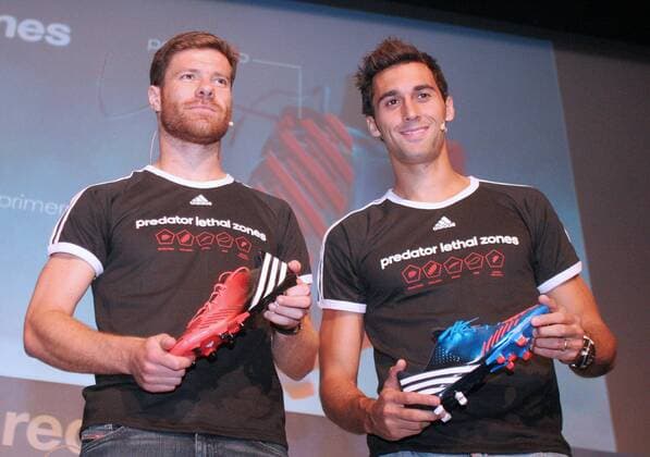 13.09.2012.Madrid, Spain. Adidas launches their latest football boot line-up called the Predator Lethal together with players from Real madrid as models. Alvaro Arbeloa and Xabi Alonso on stage xEduardoxCandelxReviejox  ActionPlus123082