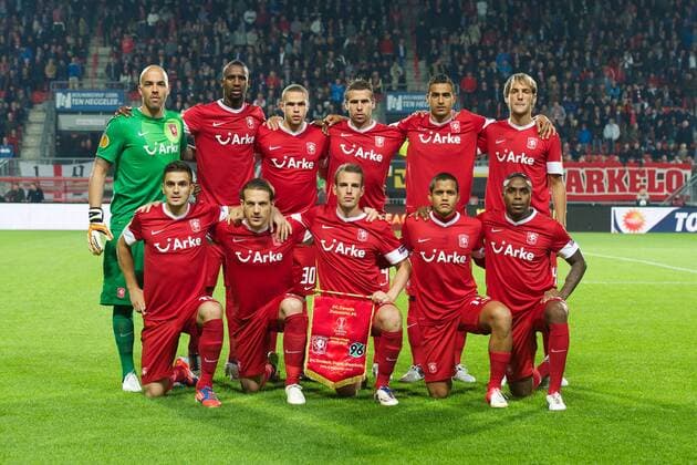 (back row L-R) goalkeeper Nikolay Mihaylov of FC Twente,Douglas Franco Teixeira of FC Twente,Luc Castaignos of FC Twente,Peter Wisgerhof of FC Twente,Nacer Chadli of FC Twente,Willem Janssen of FC Twente (Front row L-R) Dusan Tadic of FC Twente,Robbert Schilder of FC Twente,Wout Brama of FC Twente,Roberto Rosales of FC Twente,Edson Braafheid of FC Twente FC Twente Europa League 2012 2013 xVIxxIVx 1156116